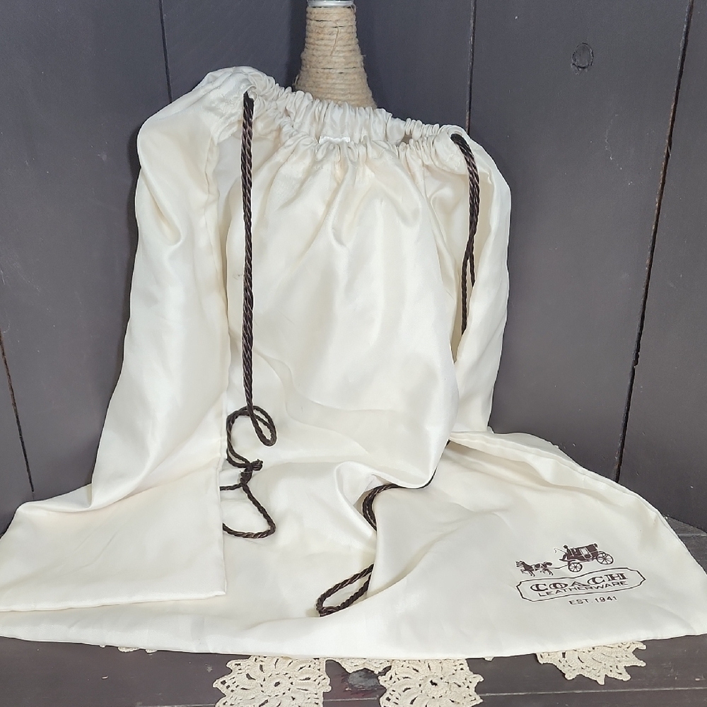 Coach Cream Drawstring Bag with Dark Ties